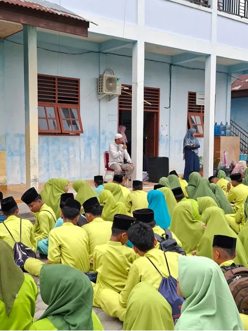 Semangat Qur’ani Siswa MTsN 3 Kampar Meriahkan Lomba Tahfiz MTQ ke-5 Desa Naumbai"